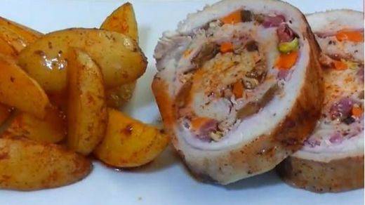 Delicioso lomo relleno al horno con patatas asadas: no te defraudará
