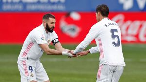 El Madrid suda sangre para remontar y ganar al colista Huesca (1-2)