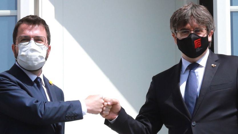 Carles Puigdemont y Pere Aragonès