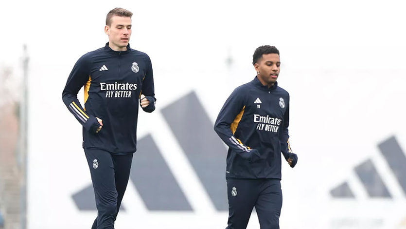 Lunin, corriendo junto a Rodrygo en un entrenamiento