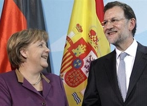 Rajoy reacciona mojándose lo justo ante Merkel: no tocará pensiones pero deja en suspense la petición del rescate