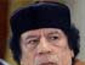 Gadafi comprometió la no asistencia del presidente sudanés