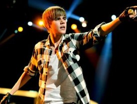 Gadafi dice que está en Trípoli y no abandonará país