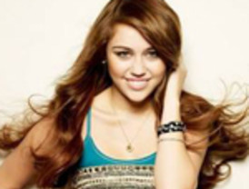 Miley Cyrus habría besado en los Grammy