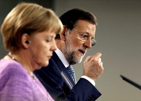 Rajoy y Merkel hablarán del futuro europeo de De Guindos los días 24 y 25 en Santiago